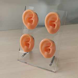 Présentoir d'écouteurs HappyHearing en silicone souple et flexible pour quatre modèles d'oreilles - Product Image 1