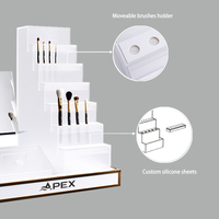 Présentoir de magasin de cosmétiques de luxe APEX Eyeliner acrylique support de brosse de maquillage présentoir de maquillage de Table pour le magasin