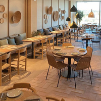 Conjunto de Mesa y Sillas para Restaurante Oriental Charm: Mesa Redonda de Piedra, Sillas de Comedor Acolchadas, Sofá Tipo Booth