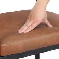 Tabourets de bar moderne et luxueux pour hôtels de l'île Pieds en métal noir Tabourets de bar pour chaises hautes de comptoir en boucle pour hôtels et restaurants