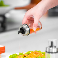 Bouteille de vinaigre d'huile en verre de 100ml avec couvercle en acier inoxydable couvercle à pression transparent bec anti-goutte cuisine conception hygiénique