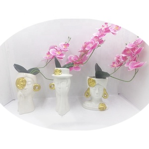 <span class=keywords><strong>Vase</strong></span> à fleurs <span class=keywords><strong>en</strong></span> céramique blanche <span class=keywords><strong>de</strong></span> conception <span class=keywords><strong>de</strong></span> <span class=keywords><strong>tête</strong></span> <span class=keywords><strong>humaine</strong></span> d'art pour la décoration <span class=keywords><strong>de</strong></span> bureau d'intérieur - Product Image 2