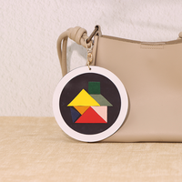 Nouveauté : Jeu de puzzle magnétique portable en cuir PU pour enfants, porte-clés pour les voyages