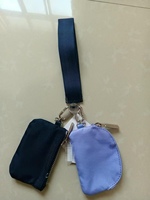 Nouvelle pochette unisexe portable minimaliste en forme de baril avec fermeture éclair pour clés, cartes bancaires, mini-monnaie, étanche en polyester, élégante et à porter à la ceinture