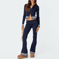 Ensemble coordonné zippé en maille pour femme avec broderie artisanale, coupe fluide et jambes larges, style survêtement raffiné