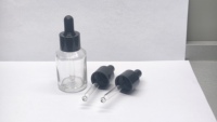 Botella de Vidrio Redonda de 30 ml Personalizada para Aceites Esenciales con Gotero y Tapa a Buen Precio