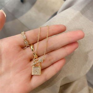 Collar de cobre de joyería, colgante de cerradura de circón con llave pequeña - Product Image 1