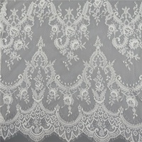 Dentelle Chantilly à larges franges noires, 100% polyester, tissu sergé biologique, motif floral caractéristique, bordure en dentelle pour robe de mariée