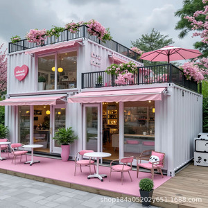 Café-restaurant moderne en conteneur avec fleurs roses et auvent, espace repas extérieur, design rectangulaire. - Product Image 2