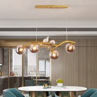 Lampe LED de luxe moderne Ampoule en verre pour oiseau Lampes suspendues Lustres de restaurant à longue bande Design créatif
