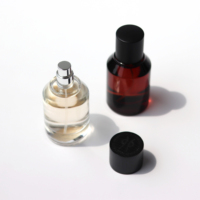 50ml Stock Amber Color Luxury Empty Cylinder Perfume Spray Glass Bottle With Black Cap