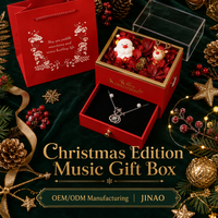 Boîte à bijoux fantaisie rouge, cadeau de Noël, boîte à musique avec pétales de rose, poupée renne et tiroir en velours pour collier
