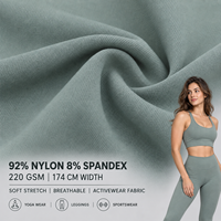 Tissu tricoté 92% nylon 8% élasthanne, 220 GSM, poids moyen, jersey uni extensible pour vêtements de sport et de mode