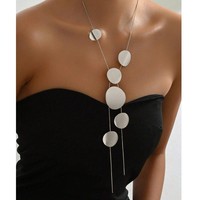 Collier géométrique circulaire en forme de cœur, design creux en Y, pendentif long créatif avec pompon