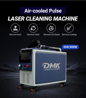 Machine de nettoyage au laser à fibre pulsée DMK MOPA 200W 300W refroidie par air 100 à 200 mm pour l'élimination de la rouille, de la peinture, de l'huile et des graffitis