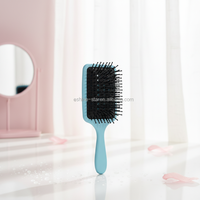 Logo privé pagaie à poils en nylon noir résistant à la chaleur et massage à coussin d'air démêlant brosse à cheveux sèche-cheveux
