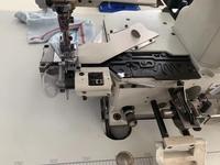 Machine à coudre interlock Pegasus W200 d'occasion, best-seller