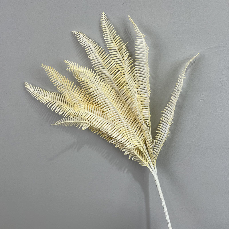 Faisceaux de feuilles persanes blanc lait