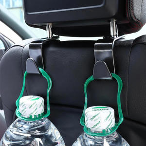 Ganchos para reposacabezas de coche, par de color negro, material ABS, para almacenamiento de botellas de agua en el interior del coche - Product Image 1