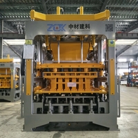 Machine à parpaings en béton entièrement automatique QTY7-15 avec système de vibration haute efficacité basse tension pour la production en série de parpaings