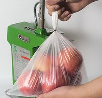 Machine à corder les ongles en aluminium avec tondeuse pour supermarché Nouvelle machine à sceller les sacs en maille de nylon manuelle d'emballage vertical
