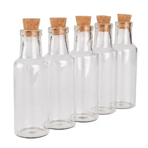 Bouteille ronde en verre de haute qualité de 8oz avec bouchon en liège pour créer différentes bouteilles de rangement en verre pour la cuisine de l'hôtel