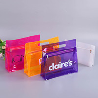 Vente en gros Trousse de toilette cosmétique en PVC coloré Orange clair de voyage avec poignée Trousse de maquillage en PVC avec fermeture éclair