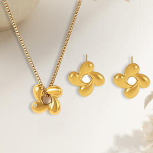 Parure de bijoux pour femme en acier titane électroplaqué, style punk, avec fleur rotative, luxe léger et exquis, couleur or - Product Image 1