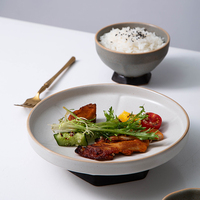 Assiettes à pied géométriques créatives en terre cuite émaillée couleur unie, assiettes à pâtes, assiettes à salade et plats froids, assiettes à steak en céramique