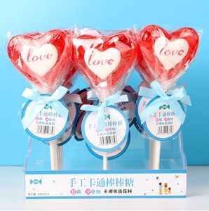 Venta al por mayor de piruletas de dibujos animados hechas a mano caja a granel dulces en forma de lindo para niños favores de fiesta, aperitivos, regalos y ventas al por menor - Product Image 4