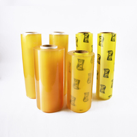Rouleau de film alimentaire en PVC souple de qualité alimentaire avec support anti-humidité pour l'emballage des nouilles et des gâteaux, traitement de moulage