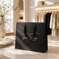 Sacs en papier noir de luxe réutilisables personnalisés avec longue poignée pour le shopping, les affaires, les vêtements, les cadeaux, avec logo en feuille d'or