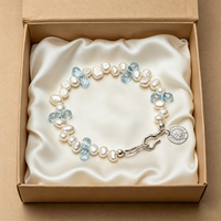 Bracelet artisanal en perles irrégulières, papillon, cristal bleu, pendentif pièce d'argent, fermoir réglable, accessoire de fête pour femme