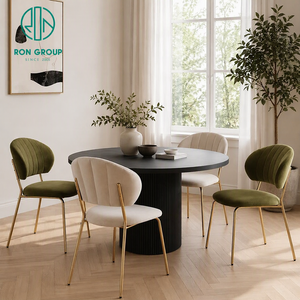 Juego de Muebles Modernos para el Hogar Ron Group: Mesa Redonda Negra con Pedestal Acanalado y Silla Ovalada Tapizada con Patas de Metal Dorado - Product Image 1
