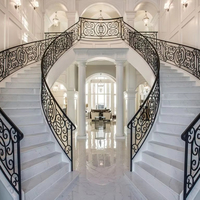 Escalier en colimaçon économique moderne de Foshan, forme incurvée double hélice, en acier galvanisé, avec garde-corps en verre, pour villa intérieure