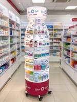 Présentoir de vente au détail rotatif à 360° personnalisé avec boîte lumineuse et roulettes, présentoir multi-niveaux pour snacks, cosmétiques et produits pharmaceutiques