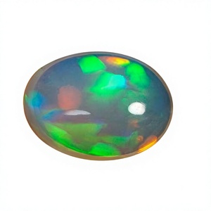 โอปอลเอธิโอเปียสีขาว 5.80 กะรัต แบบเม็ดเดี่ยว ผลิตในห้องปฏิบัติการ ได้รับการรับรองจากผู้ตรวจสอบอิสระ  มีสีสันเปลี่ยนแปลง ใช้เป็นเครื่องประดับประจำเดือนตุลาคม - Product Image 1