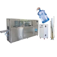Machine de lavage, de remplissage et de bouchage de bouteilles de 5 gallons à écran tactile 150 bph QGF-150 18,9 L 20 L Machine de mise en bouteille d'eau