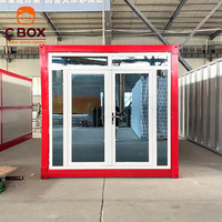 Cbox Maison Conteneur Modulaire Pliable avec Porte Vitrée à Cadre Rouge pour Bureau, Logement ou Site de Chantier