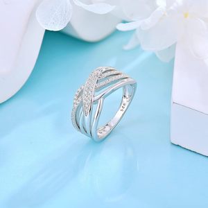 Gioiello di fidanzamento per matrimonio X anelli a fascia incrociata 925 anello in zirconio cubico con nodo celtico infinito in argento Sterling - Product Image 2