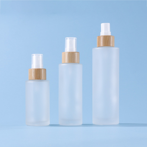Luxury <b>30ml</b> 40ml 100ml 120ml Frosted Glass Body Oil <b>Bottle</b> with Screen Printed Bamboo Cap and Pump Sprayer for Skincare - Product Image 1