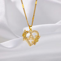 Collier ras du cou minimaliste transfrontalier avec pendentif en zircon, motif fleur et lettre, ajouré en forme de cœur