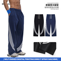 Pantalon décontracté pour homme à rayures et blocs de couleur, taille mi-haute, cordon de serrage, jambe large, en mélange coton-polyester, style streetwear américain, collection printemps