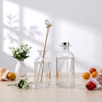 Bouteille diffuseur en verre vide ronde 200ml 350ml 500ml, impression de logo personnalisée, bouchon en caoutchouc, usine OEM ODM