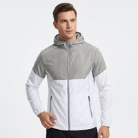 Veste coupe-vent légère pour homme, style sweat à capuche, avec fermeture éclair et design patchwork, pour activités de plein air
