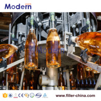 Machine de remplissage d'alcool de bouteille en verre entièrement automatique de 500ml intégration de précision électrique pour le capsulage et l'étiquetage de whisky vodka