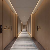 Suite de mobilier sur mesure pour chambre d'hôtel étoilé, lit double plateforme avec placard intégré et comptoir de travail
