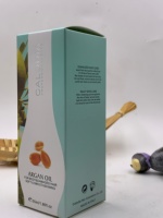 Sérum capillaire réparateur professionnel CALODIA 55ml à l'huile d'argan bio du Maroc pour des cheveux doux, lisses et brillants, sans rinçage