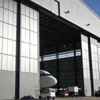 Hangar d'avion en structure acier JINGYI facile à assembler, kit d'entrepôt préfabriqué, garantie 3 ans, design moderne 50