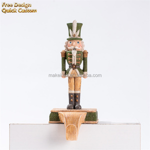 Hot Sale Green <strong>Vintage</strong> Nutcracker Figurine with Feather Hat Design for Xmas Tabletop Holiday Decor <strong>Christmas</strong> <strong>Village</strong> - Product Image 1